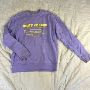 Purple sweatshirt with yellow graphics